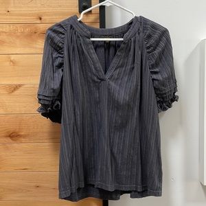 Slate blue grey shortsleeved top.
